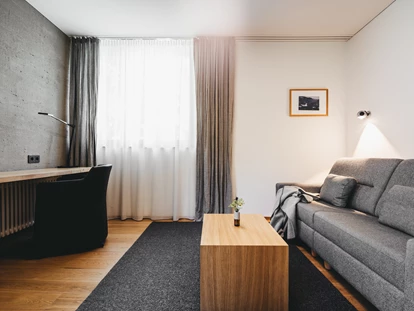 Hotels an der Piste - Mellau - Suite Wohnzimmer - Das Naturhotel Chesa Valisa****s