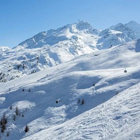 Skihotel: Skifahren im strahlenden Sonnenschein am Gletscher - Skihotel Edelweiss Hochsölden