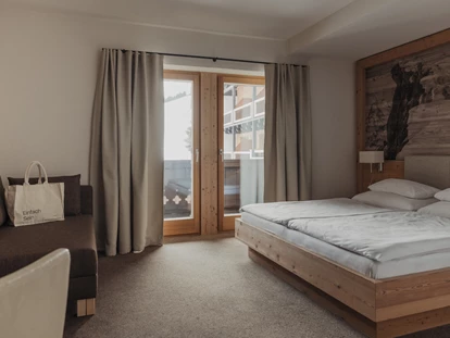 Hotels an der Piste - PLZ 6373 (Österreich) - Doppelzimmer Abendlicht - Hotel Marten