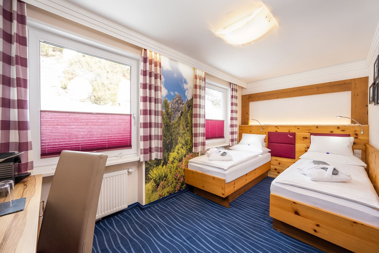 Hotel Alpina Zimmerkategorien Doppel-/Twinbettzimmer