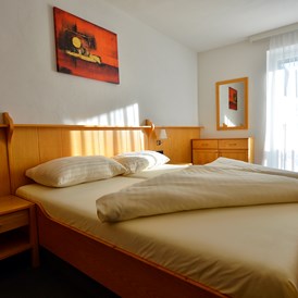 Skihotel: traditionelles Zimmer - Almhotel Kärnten