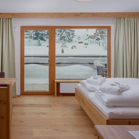 Skihotel: die Premium Zimmer Juniorsuite Melisse  - Naturhotel Kitzspitz