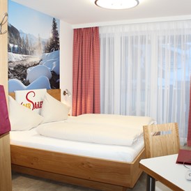 Skihotel: gemütliche Zimmer - Hotel & Restaurant DER SAILER