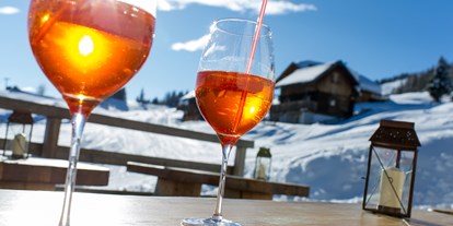 Hotels an der Piste - Skikurs direkt beim Hotel: eigene Skischule - West-Terrasse mit Aperol und mehr ...  - Sattleggers Alpenhof & Feriensternwarte 