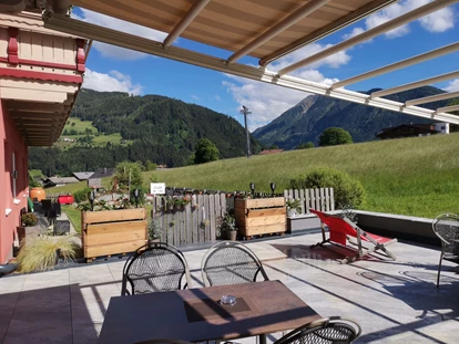 Hotels an der Piste - Ramsau am Dachstein - Hotel Pariente Sonnenterrasse und Garten - Hotel Restaurant Pariente
