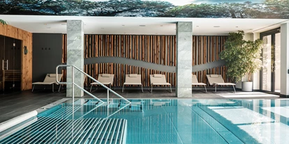 Hotels an der Piste - Skiverleih - ALMGUT Mountain Wellness Hotel