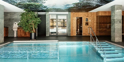 Hotels an der Piste - Skiverleih - ALMGUT Mountain Wellness Hotel