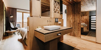 Hotels an der Piste - Skiverleih - ALMGUT Mountain Wellness Hotel