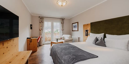 Hotels an der Piste - Skiverleih - ALMGUT Mountain Wellness Hotel