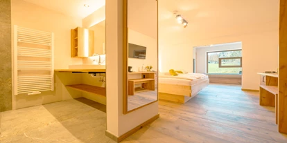 Hotels an der Piste - Skiverleih - Unsere im Sommer 2024 neu errichteten Baumstudios laden ein. - Familienhotel Unterreith