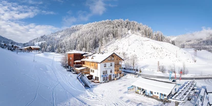 Hotels an der Piste - Skiverleih - Hotel direkt an der Talstation 8er-Gondelbahn Fageralm - Familienhotel Unterreith