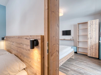 Hotels an der Piste - Skikurs direkt beim Hotel: für Kinder - Familienzimmer - COOEE alpin Hotel Bad Kleinkirchheim
