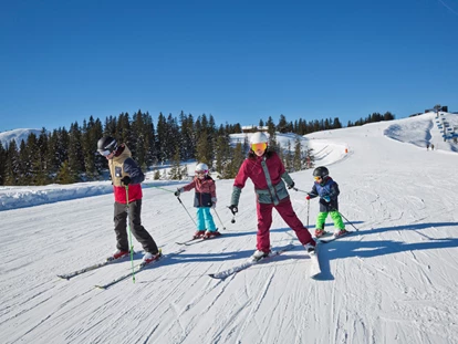 Hotels an der Piste - PLZ 6373 (Österreich) - Skigenuss für die ganze Familie in Saalbach Hinterglemm  - 4****S Hotel Hasenauer