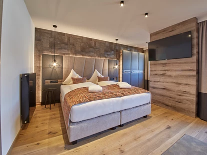 Hotels an der Piste - PLZ 6373 (Österreich) - Zimmer im Neuen Stil - 4****S Hotel Hasenauer