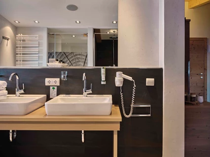 Hotels an der Piste - PLZ 6373 (Österreich) - Geräumige Zimmer mit allen Annehmlichkeiten - 4****S Hotel Hasenauer