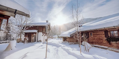 Hotels an der Piste - Schneizlreuth - Chaletdorf im Winter - Naturresort PURADIES