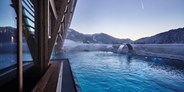 Hotels an der Piste - Allgäu - Infinity-Pool im Mountain Spring Spa - HUBERTUS MOUNTAIN REFUGIO ALLGÄU