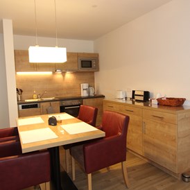 Skihotel: Beispielbild Wohnraum mit Küche - H&P Residenz Grafenmatt