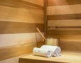 Skihotel: Inhouse-Sauna für abendliche Erholung nach einem langen Skitag - KAUZ - Design Chalets