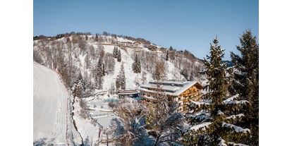 Hotels an der Piste - Hotel-Schwerpunkt: Skifahren & Familie - Gartenhotel Theresia in Saalbach-Hinterglemm
"Vom Frühstück auf die Piste, von der Piste in die Pools" - Erstklassig & down to Earth - das bio-zertifizierte Gartenhotel Theresia****S 